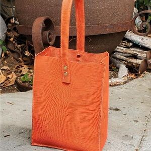 NWT Orange lizard leather purse by Vena Vena